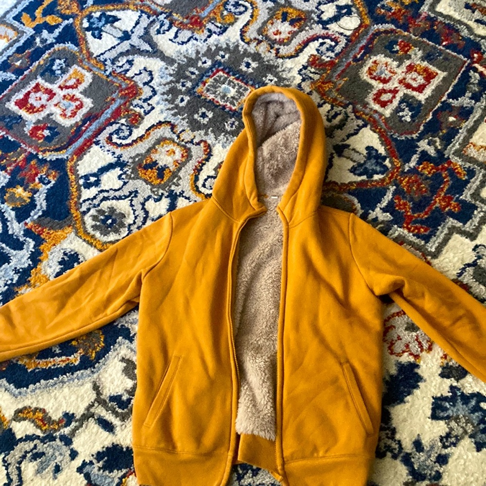This is a warm sweater, used, in good condition not staines or rips